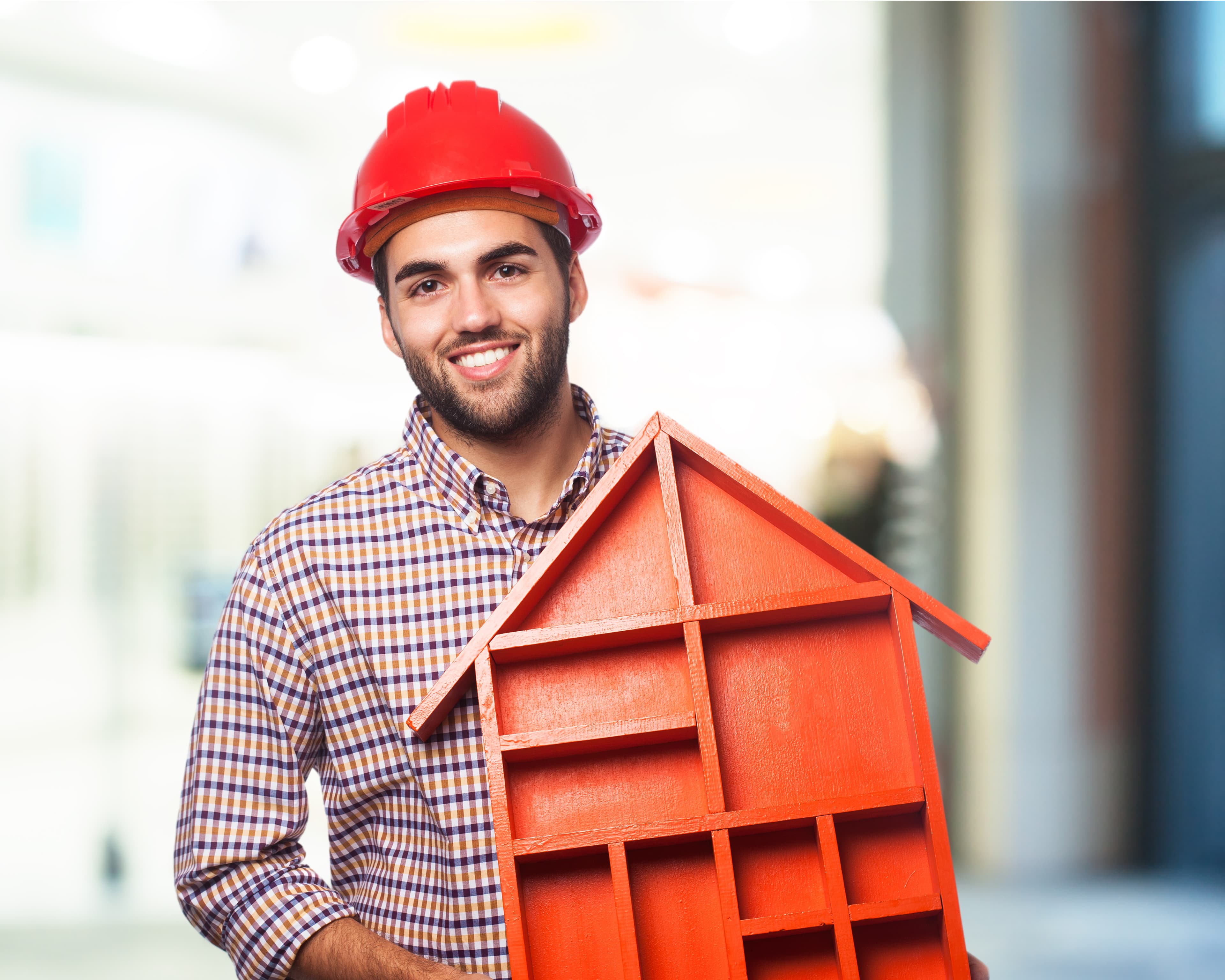 Professional roofing specialist working on a residential roof